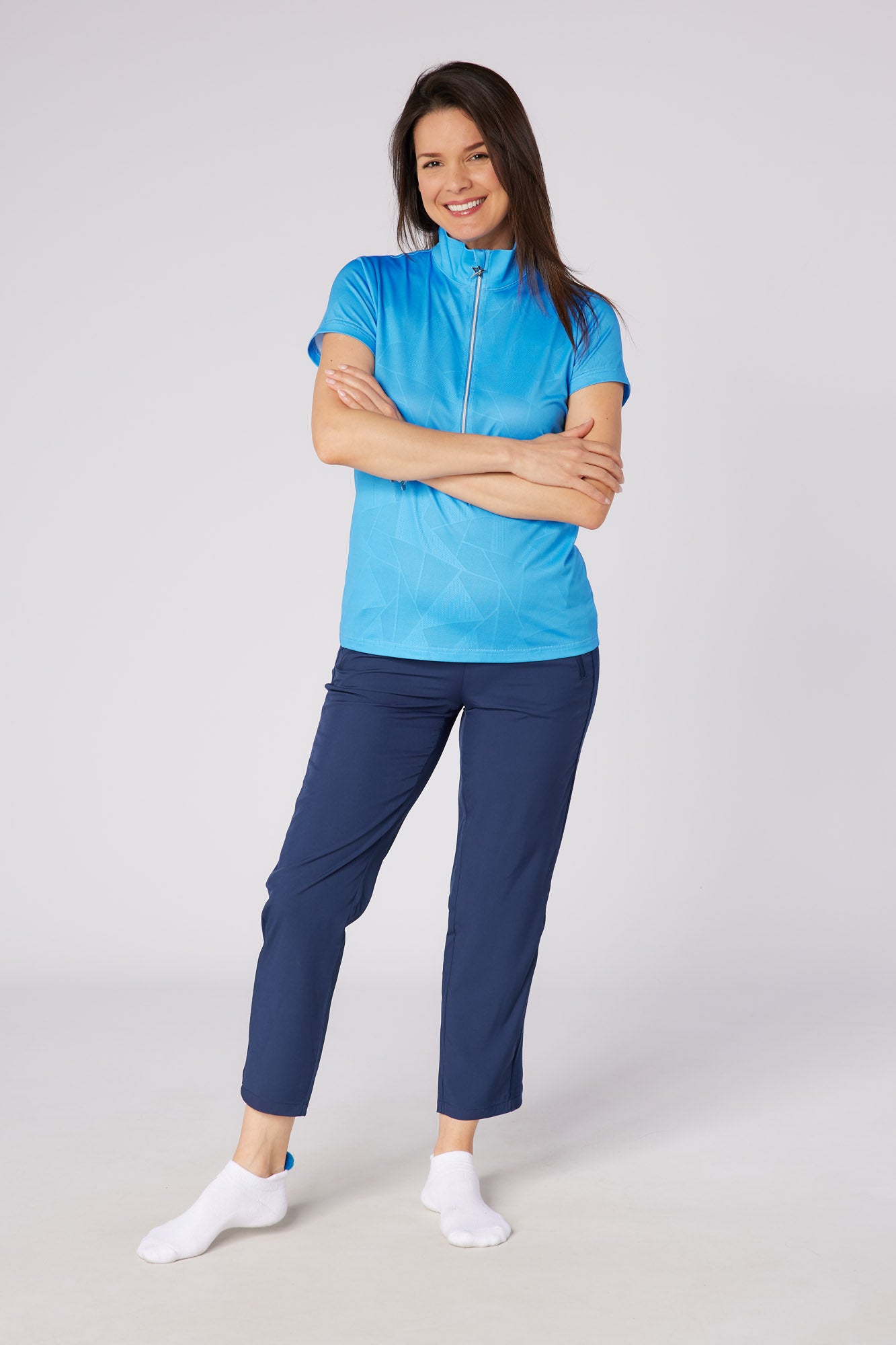 Swing out Sister Embossed Mirage Cap Sleeve Ladies Polo with Zip Neck in Ocean Blue